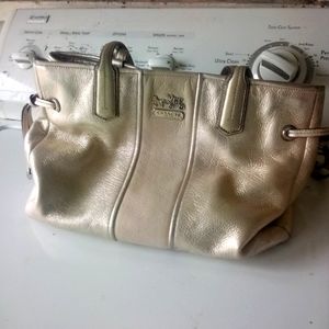 Coach purse rose gold